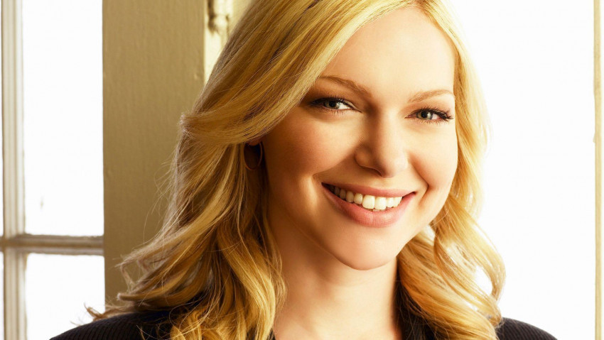 Cover Photo of Laura Prepon